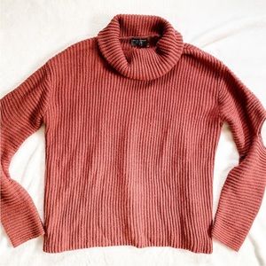 Dress Forum Pink chunky “cold elbow” turtleneck sweater
